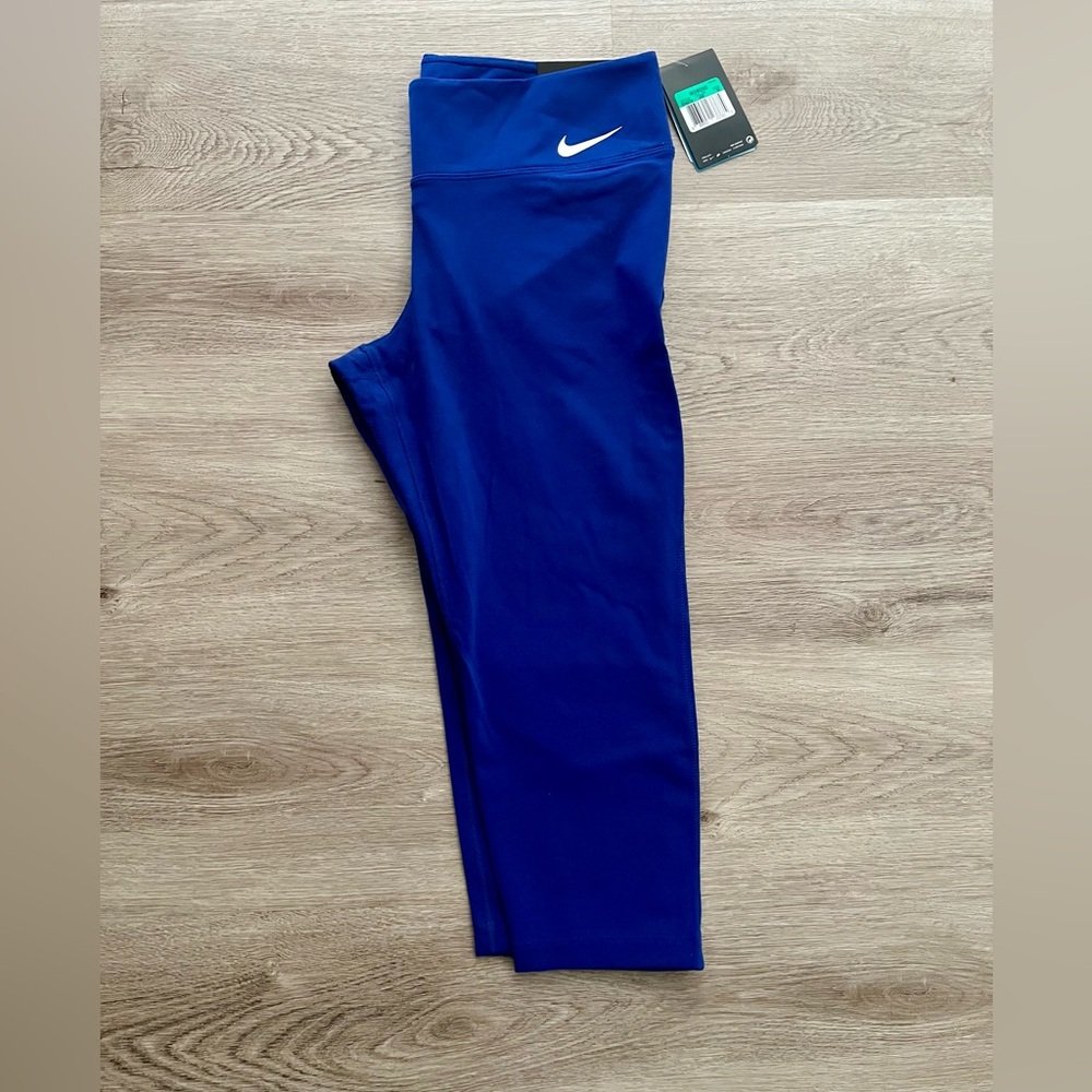 Nike Legendary Tight Fit Leggings in Blue